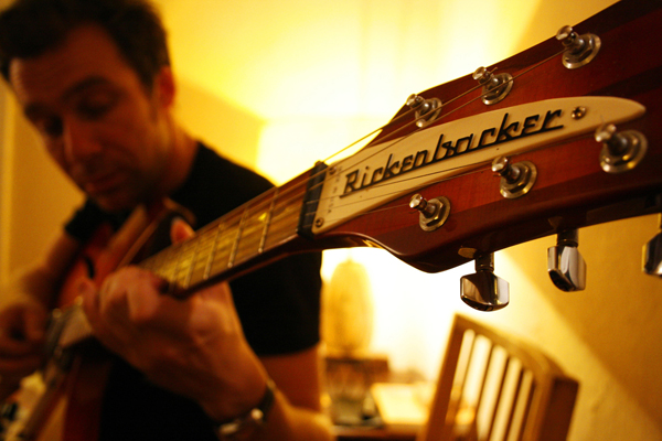 Naim Amor plays his new Rickenbacker guitar in practice on Monday, Sept. 22, 2008 in Tucson, Ariz. Photo: Kristina L. Stevens